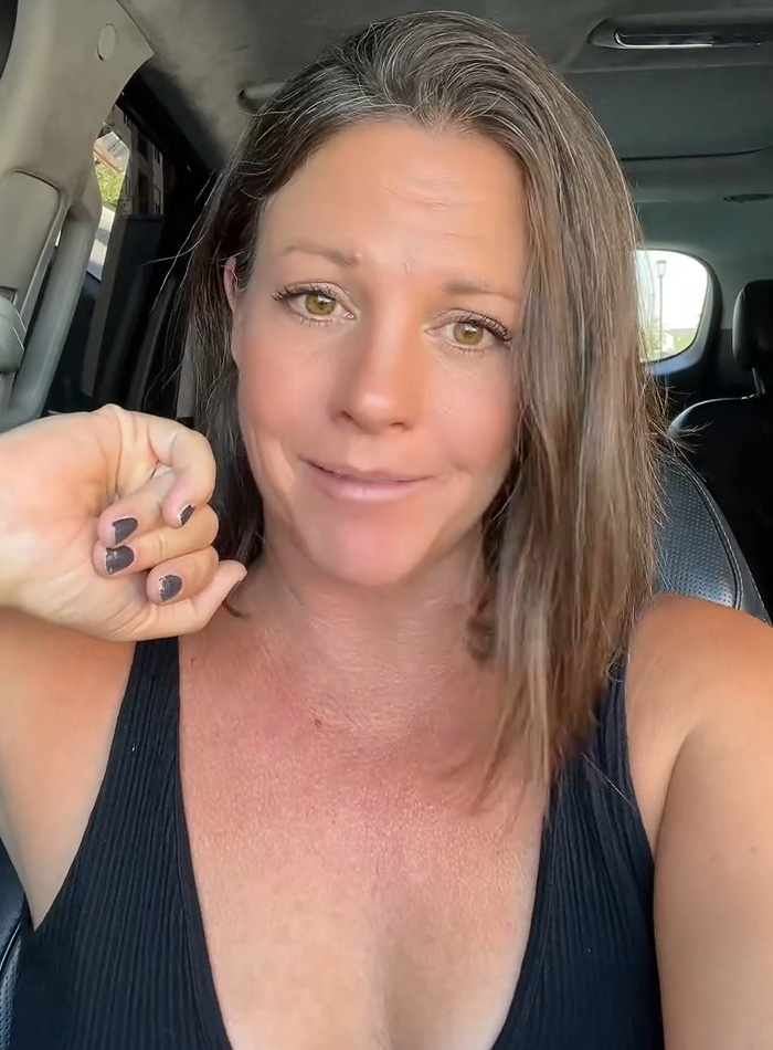 A woman with a thoughtful expression, discussing her marriage and the impact of living in separate apartments. A woman with a thoughtful expression, discussing her marriage and the impact of living in separate apartments.