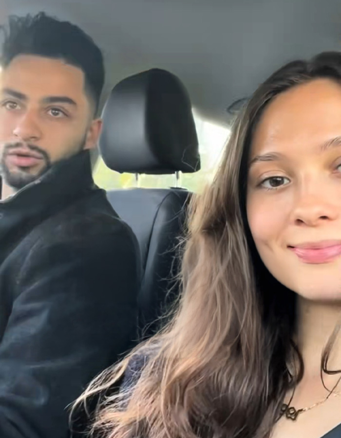 A woman and her boyfriend in a car, seemingly fine before unexplained symptoms began months later. A woman and her boyfriend in a car, seemingly fine before unexplained symptoms began months later.