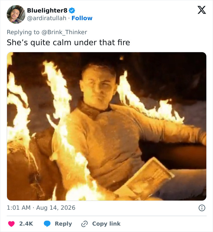 Man calm amidst fire, a viral meme showing an executive decision on social media. Man calm amidst fire, a viral meme showing an executive decision on social media.