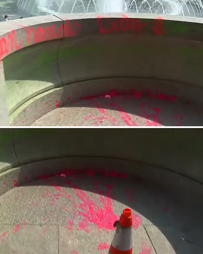 A WWII memorial fountain vandalized with pink and green paint, showing the aftermath of a woman's fury.