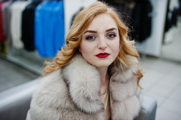 Woman in a fur coat, highlighting comments from women that made men go from planning date nights to planning their escape.
