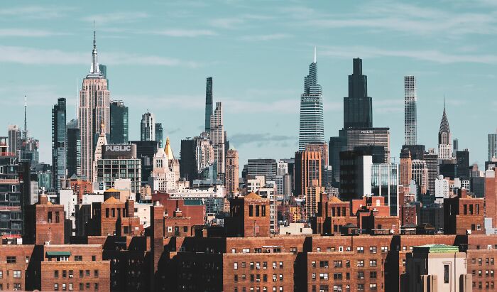 New York City skyline, symbolizing the environment where women share things they put up with.