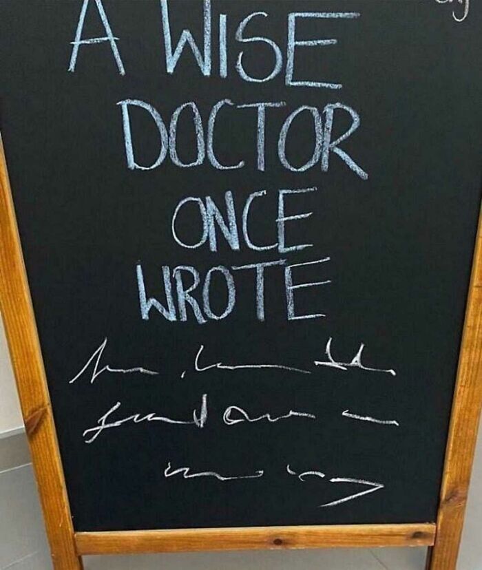 A chalkboard displaying a humorous, unreadable doctor's prescription, illustrating dry British humor.