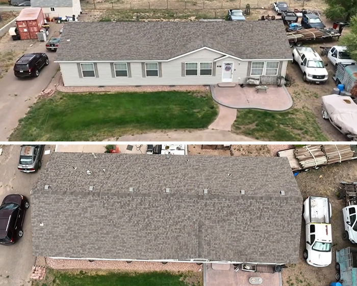 An aerial view of a Zillow listing house and the surrounding property, including cars and trailers. An aerial view of a Zillow listing house and the surrounding property, including cars and trailers.