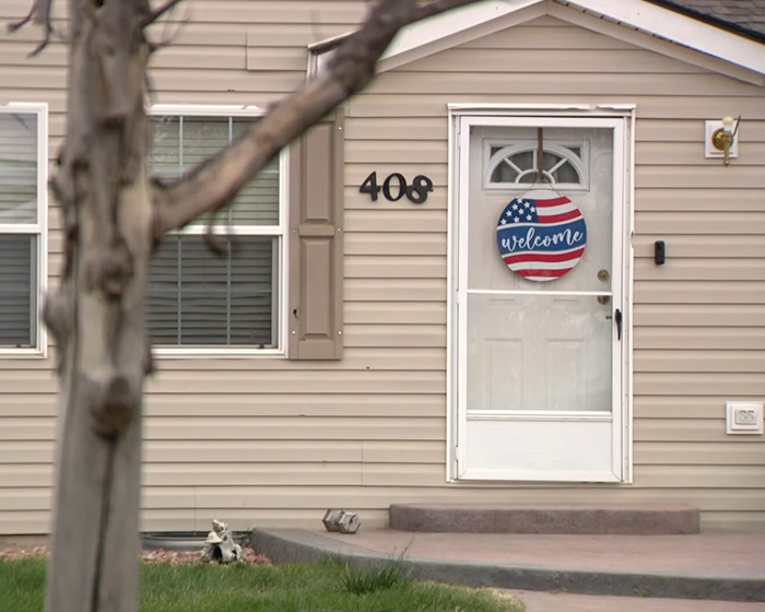 A close-up of a Zillow listing house entrance, featuring a welcome sign and house number. A close-up of a Zillow listing house entrance, featuring a welcome sign and house number.