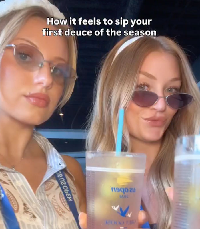 US Open influencers posing with drinks, highlighting their controversial presence at the event. US Open influencers posing with drinks, highlighting their controversial presence at the event.