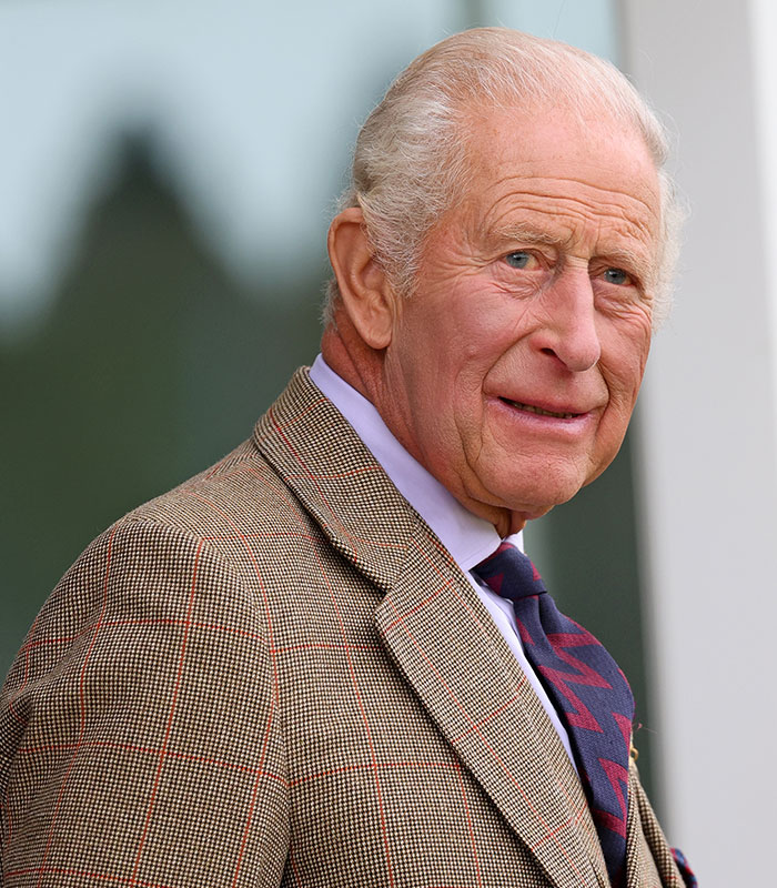 King Charles looks on with a slight smile, his statement dealing a blow to Harry and Meghan's UK move. King Charles looks on with a slight smile, his statement dealing a blow to Harry and Meghan's UK move.