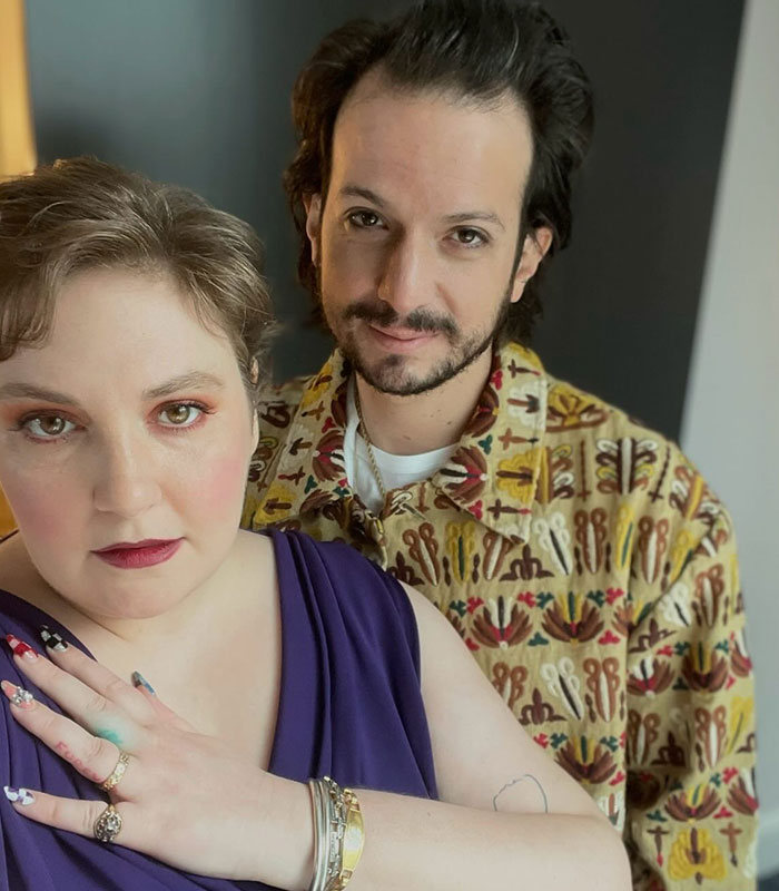 Lena Dunham with her partner, facing backlash for welcoming first baby via surrogate. Lena Dunham with her partner, facing backlash for welcoming first baby via surrogate.