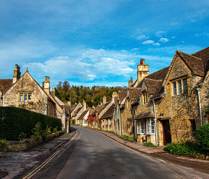 Charming UK homes line a winding street, a potential new UK home for Meghan Markle. Charming UK homes line a winding street, a potential new UK home for Meghan Markle.