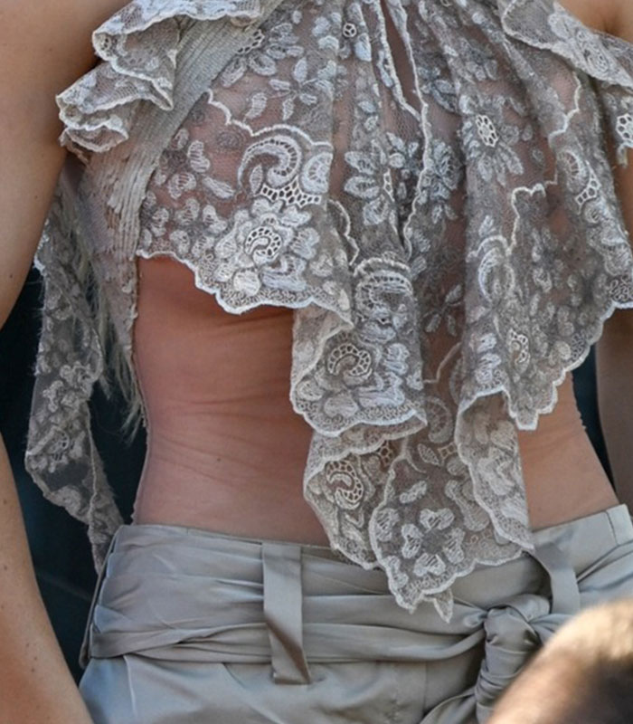 Close-up of Sydney Sweeney's rib and stomach, highlighting the mysterious marks that have netizens zooming in. Close-up of Sydney Sweeney's rib and stomach, highlighting the mysterious marks that have netizens zooming in.
