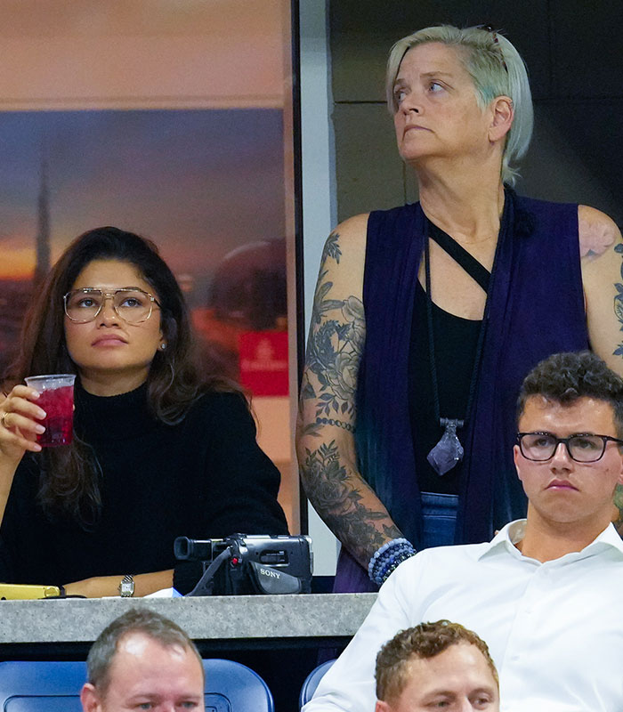 Zendaya and her mom looking on, experiencing Instagram comment struggles. Zendaya and her mom looking on, experiencing Instagram comment struggles.