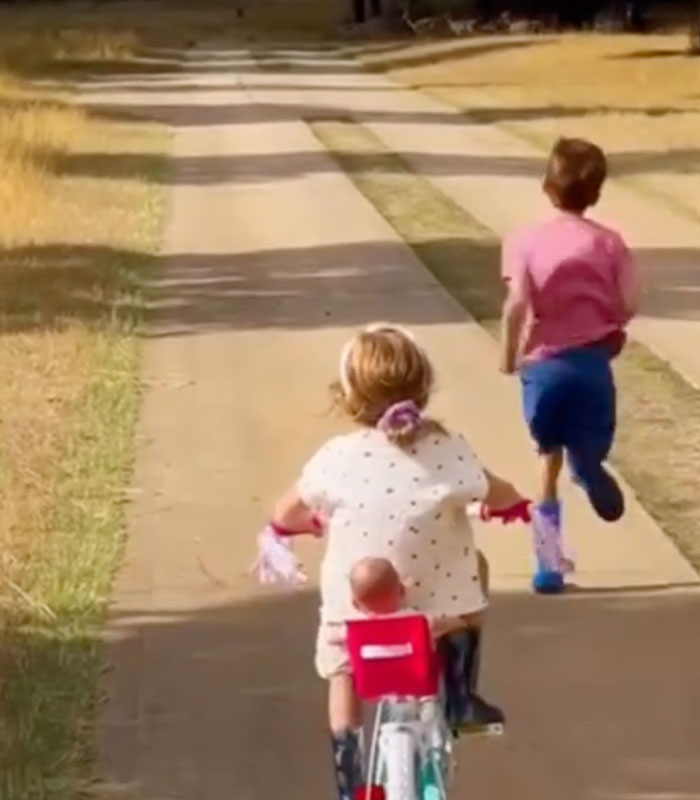 Archie and Lilibet running and biking, after Meghan and Harry pulled them from school.