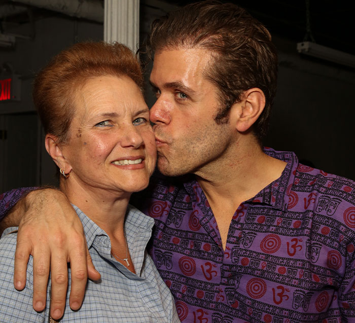 Perez Hilton kissing his family member, amid reports of disfigurement and GoFundMe to help raise his kids.