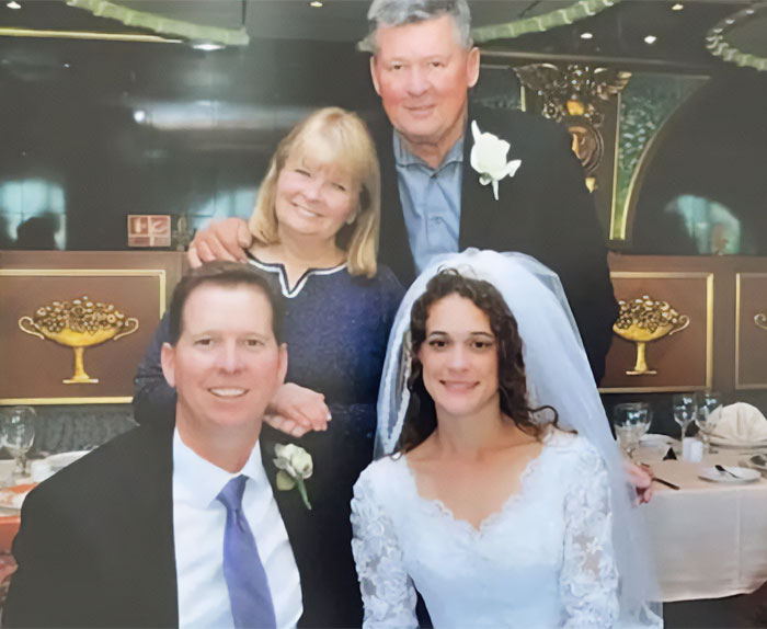 A wedding photo of the dad of 3 and his wife during happier times before the cruise ship anniversary trip A wedding photo of the dad of 3 and his wife during happier times before the cruise ship anniversary trip