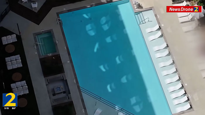 An aerial drone shot of the pool area below the apartment where the UGA student fell. An aerial drone shot of the pool area below the apartment where the UGA student fell.