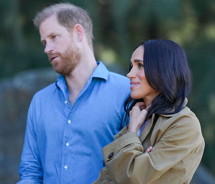 Prince Harry and Meghan Markle look on, as discussions continue about her UK home demands. Prince Harry and Meghan Markle look on, as discussions continue about her UK home demands.