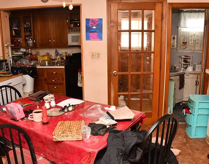 A cluttered kitchen and dining area in the house where a stephson was held captive. A cluttered kitchen and dining area in the house where a stephson was held captive.