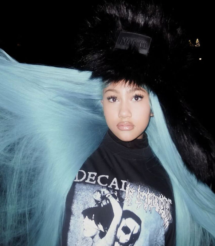 North West at 13, in a striking photo comparison with Kim Kardashian, ignites parenting controversy.