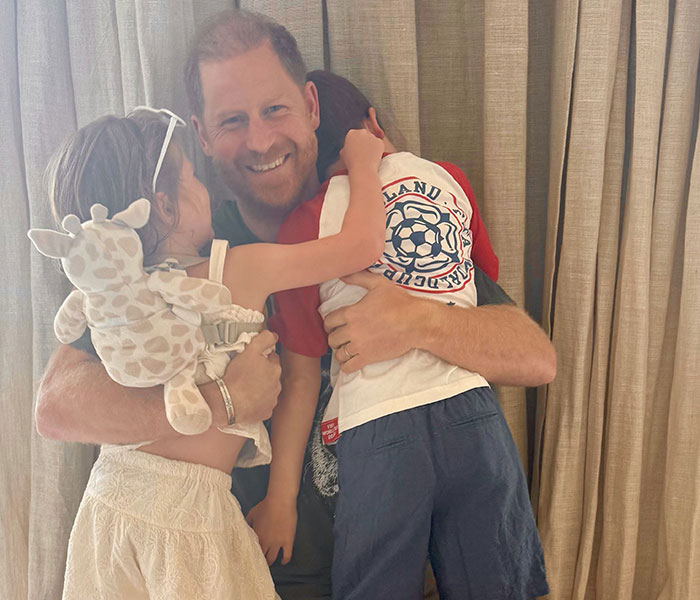 Prince Harry with his children, part of a story about Meghan Markle's demands for a new UK home. Prince Harry with his children, part of a story about Meghan Markle's demands for a new UK home.
