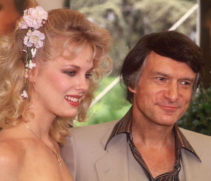 Hollywood beauty goddess Dorothy Stratten smiling next to Hugh Hefner at an event. Hollywood beauty goddess Dorothy Stratten smiling next to Hugh Hefner at an event.