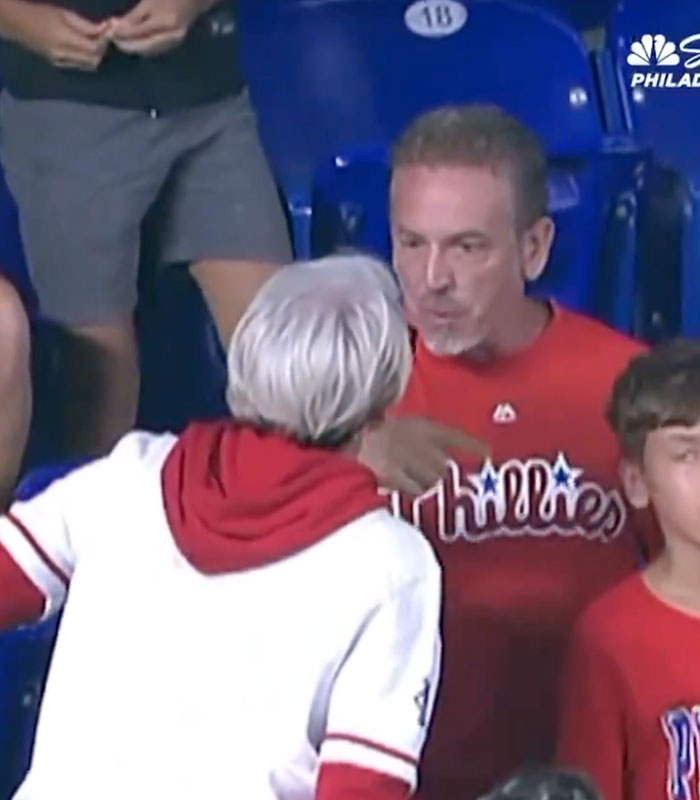Heated argument between fans in the stands at a sports match. Heated argument between fans in the stands at a sports match.