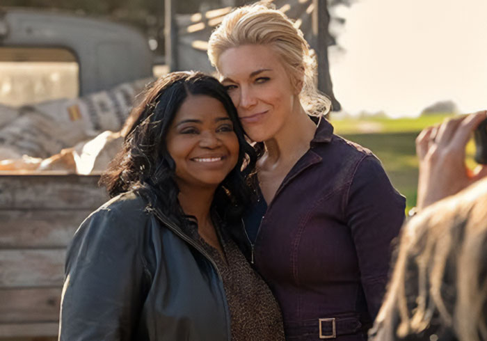 Two happy female characters posing together, highlighting the cast from the female-centric show cancelled by Amazon.