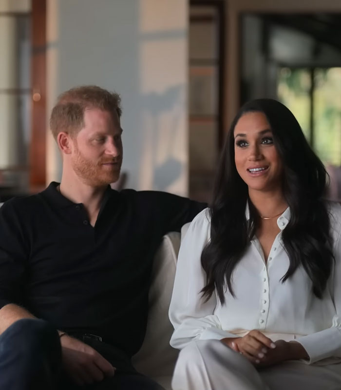 Prince Harry looking at Meghan Markle, paternity back in question, sparking DNA test discussions. Prince Harry looking at Meghan Markle, paternity back in question, sparking DNA test discussions.