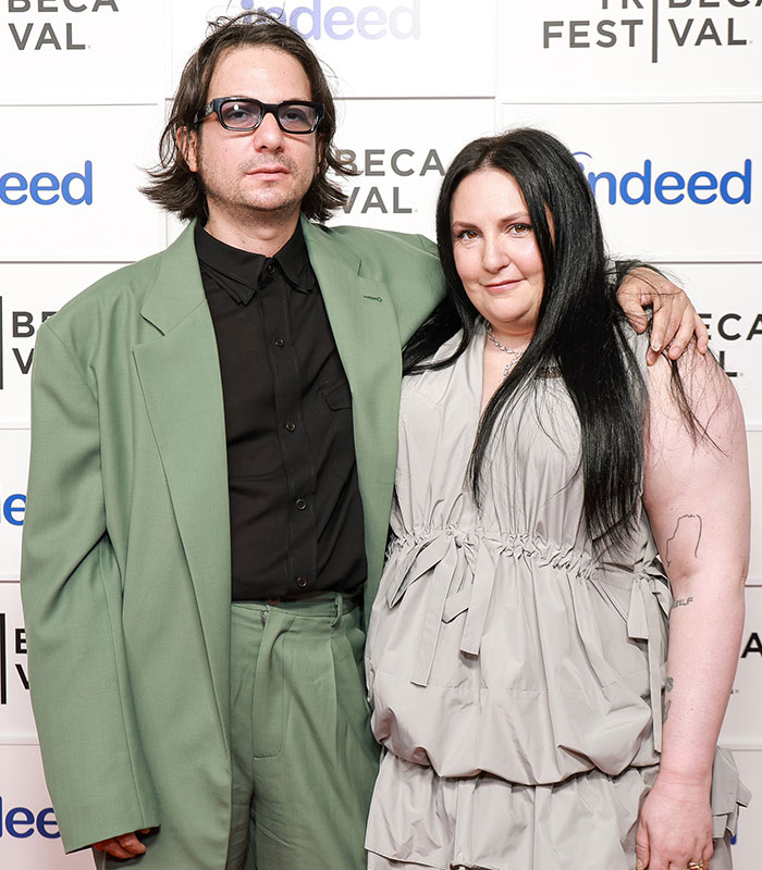 Lena Dunham and her husband pose, facing backlash after welcoming first baby via surrogate. Lena Dunham and her husband pose, facing backlash after welcoming first baby via surrogate.