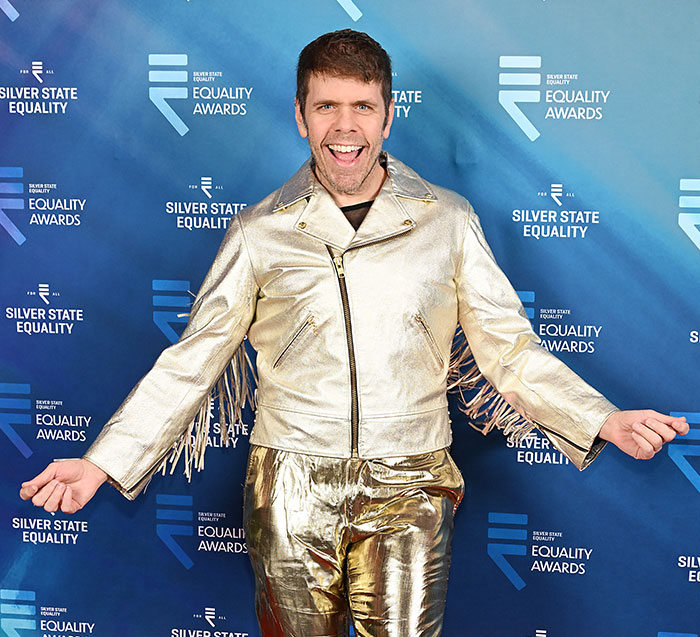 Perez Hilton in a gold jacket at the Silver State Equality Awards.