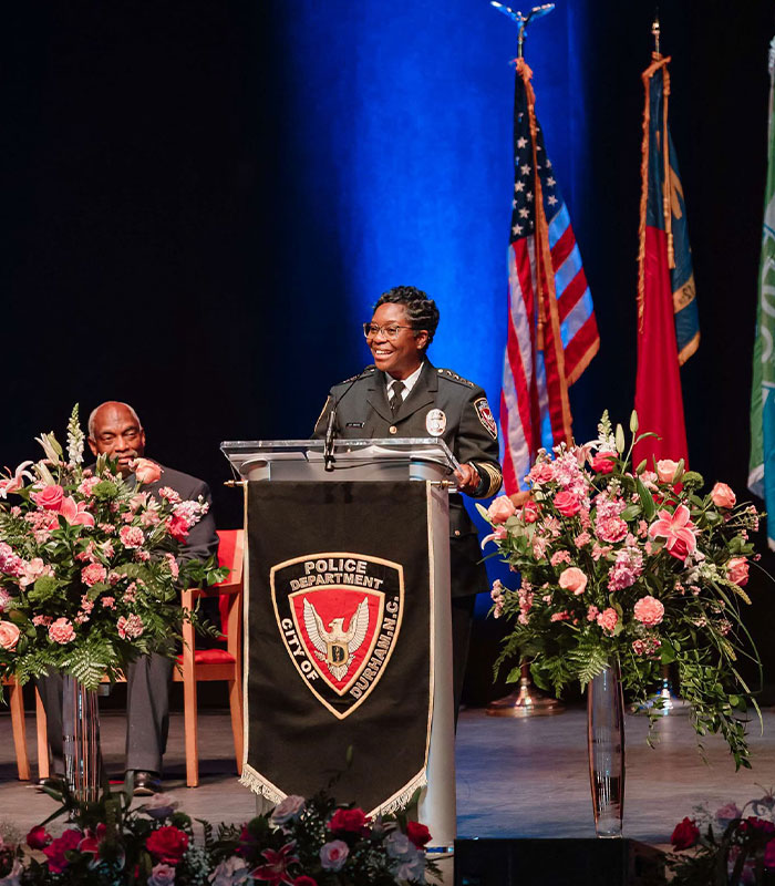 Chief Patrice Andrews speaking at a podium, in context of the aftermath of the woman hurling N-word. Chief Patrice Andrews speaking at a podium, in context of the aftermath of the woman hurling N-word.