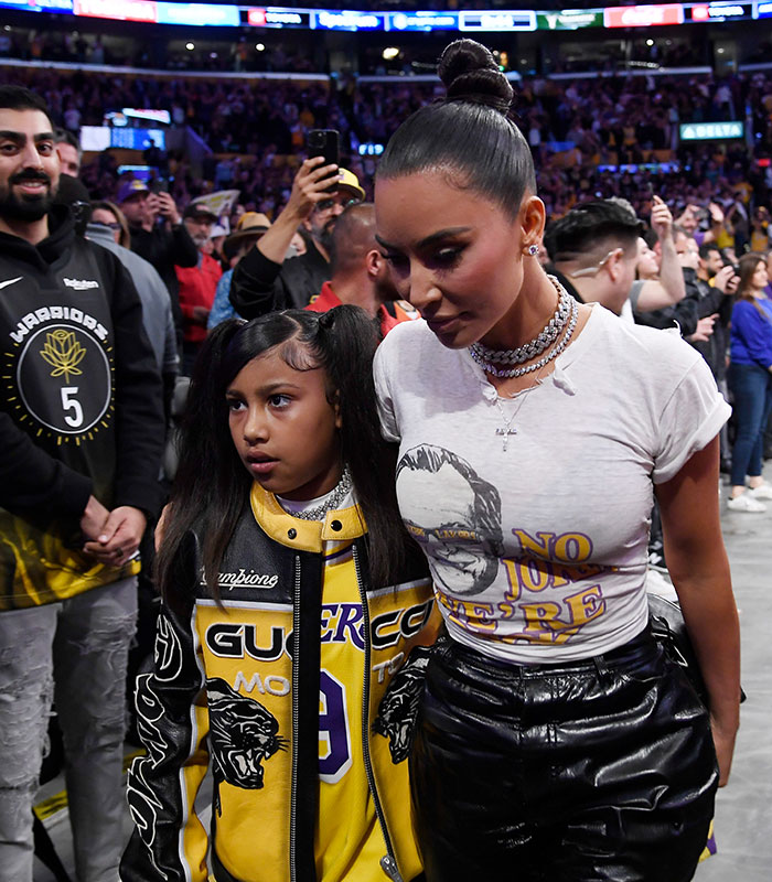 Kim Kardashian and daughter North West at 13, their photo comparison sparking parenting controversy.
