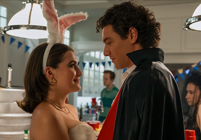 Two young actors in costume looking at each other in a scene from the Amazon female-centric show.