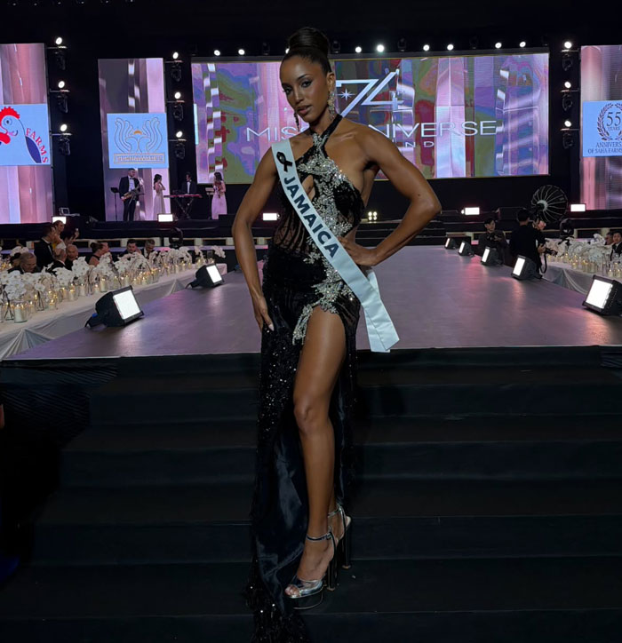 Miss Universe Jamaica Gabrielle Henry posing in a black evening gown at the Miss Universe stage event Miss Universe Jamaica Gabrielle Henry posing in a black evening gown at the Miss Universe stage event