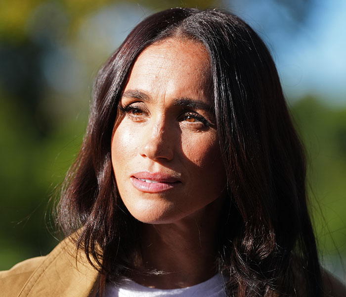 Meghan Markle looks on, as netizens slam her for wild demands for a new UK home. Meghan Markle looks on, as netizens slam her for wild demands for a new UK home.
