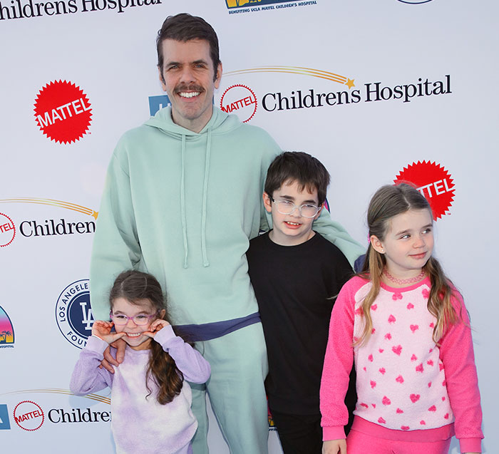 Perez Hilton with his three children at a Children's Hospital event.