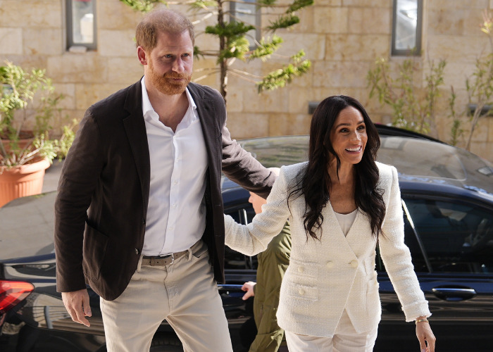 Harry and Meghan UK return, walking outdoors, amidst tension and new school rules for parents. Harry and Meghan UK return, walking outdoors, amidst tension and new school rules for parents.