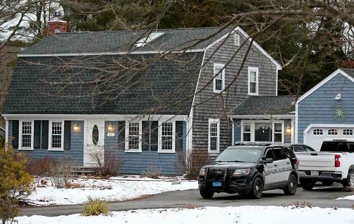 Police vehicles parked outside a house, related to the Lindsay Clancy trial that ended in a mistrial. Police vehicles parked outside a house, related to the Lindsay Clancy trial that ended in a mistrial.