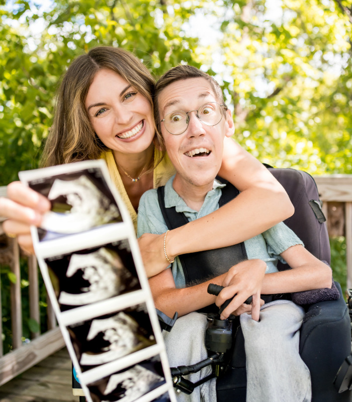 Excited TikTok stars, a couple, holding ultrasound images, announcing their pregnancy journey after sharing intimacy. Excited TikTok stars, a couple, holding ultrasound images, announcing their pregnancy journey after sharing intimacy.