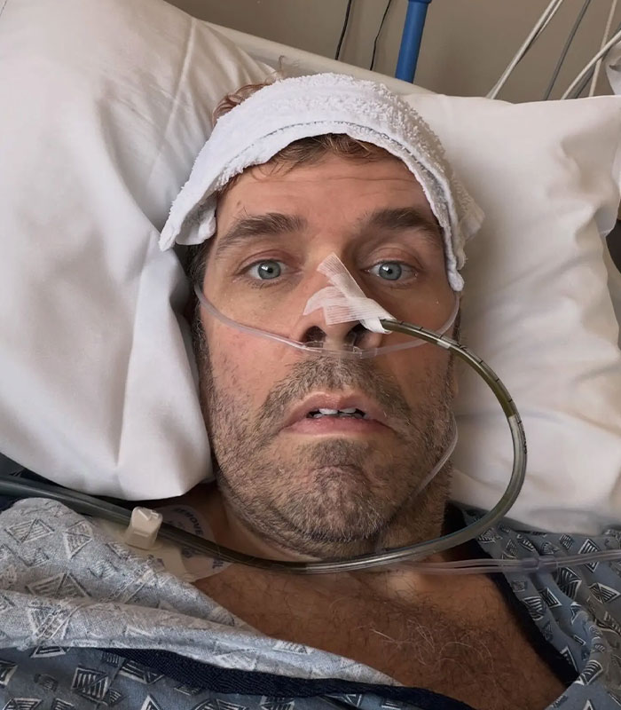 Perez Hilton crisis deepens, appearing ill in a hospital bed with an oxygen tube and a towel on his head. Perez Hilton crisis deepens, appearing ill in a hospital bed with an oxygen tube and a towel on his head.