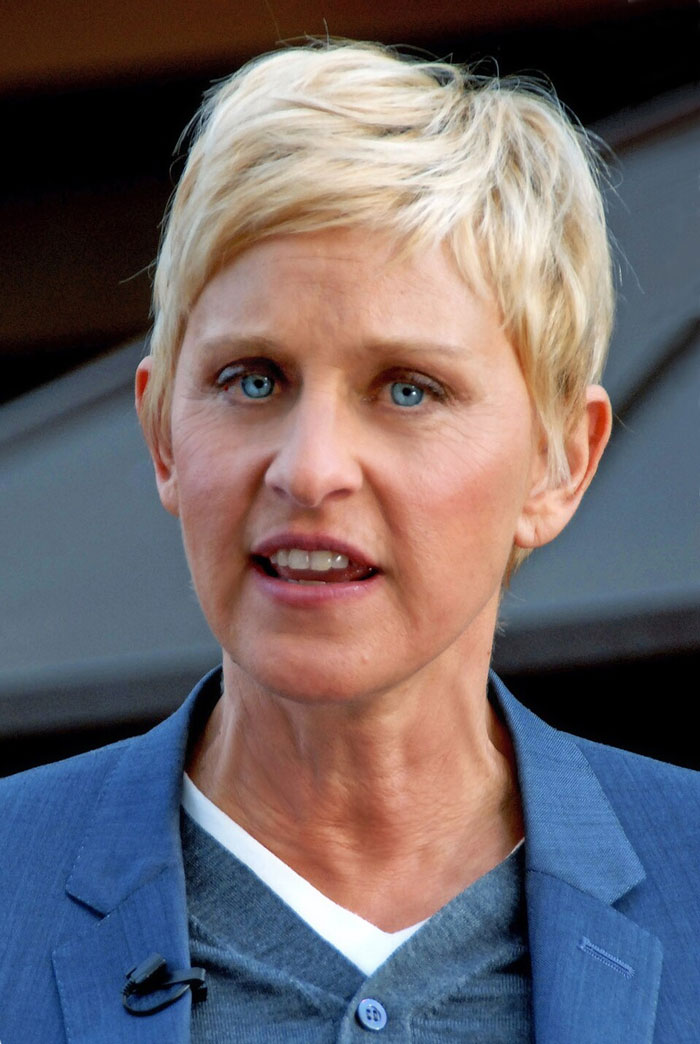 Close-up of Ellen DeGeneres with blue eyes, revealing Hollywood secrets.