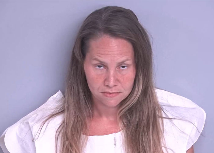 Mugshot of children's mother accused of being an attacker, after her last words identification. Mugshot of children's mother accused of being an attacker, after her last words identification.