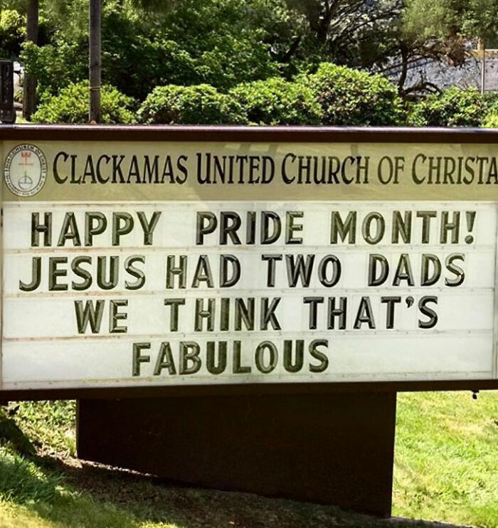 Church sign humorously celebrating Pride Month with Jesus having two dads