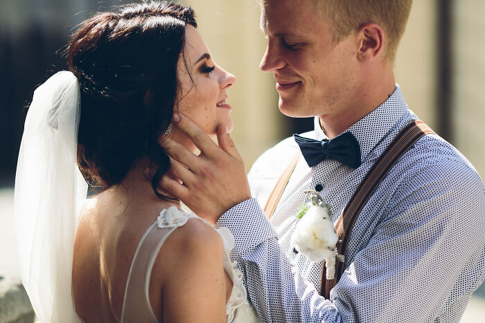 A bride and groom sharing a close moment, symbolizing family and marriage cases argued by lawyers