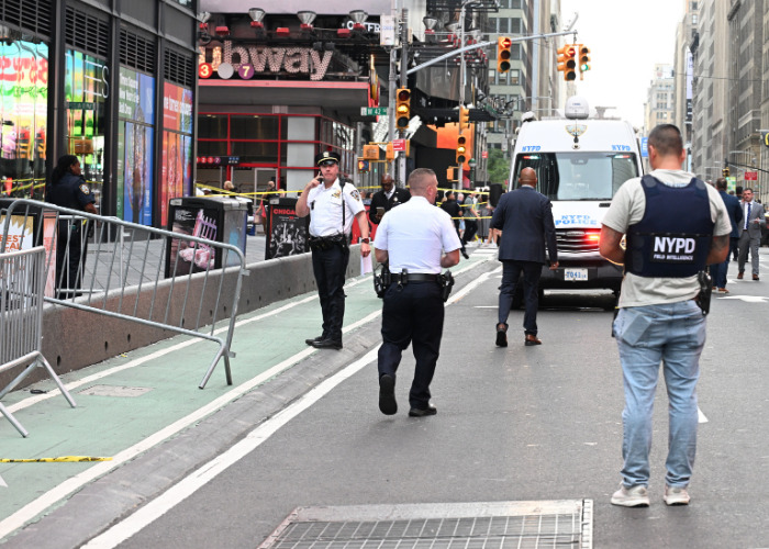 Dramatic video shows Times Square attacker confrontation with cops and Bank of America VP victim revealed aftermath. Dramatic video shows Times Square attacker confrontation with cops and Bank of America VP victim revealed aftermath.