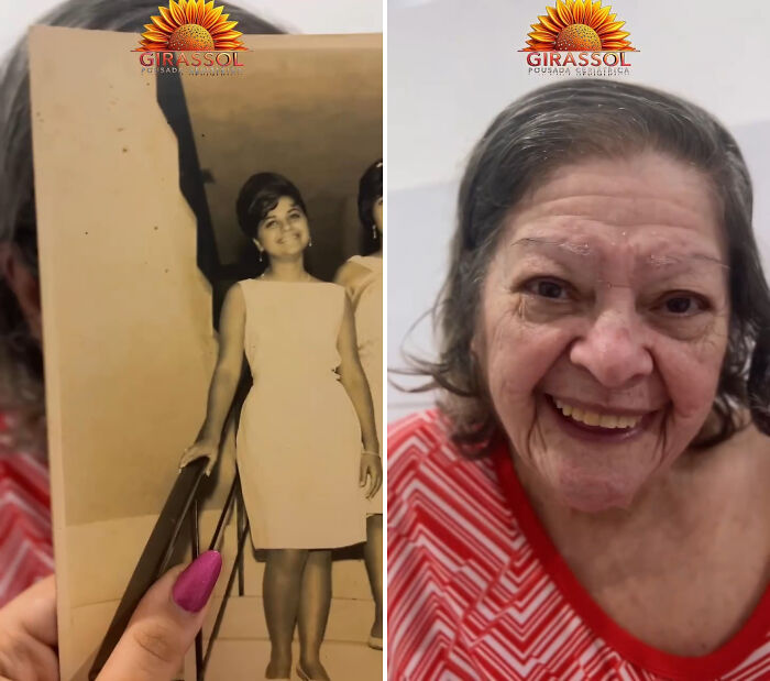 Smiling nursing home resident in Brazil holding her younger self photo, a heartwarming trend.