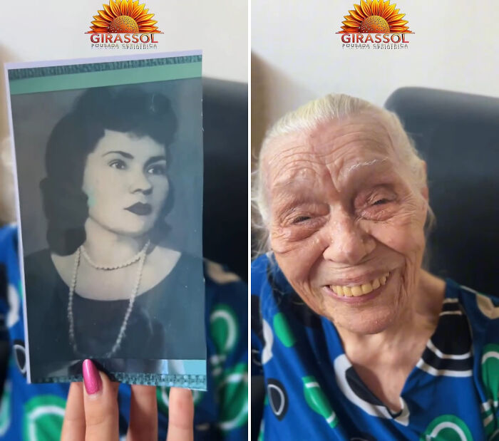 Nursing home resident in Brazil smiling, holding a photo of her younger self.