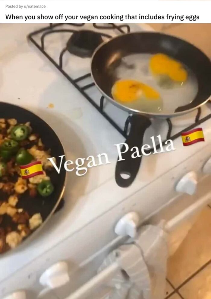 Photo of eggs frying on stove sarcastically labeled vegan paella