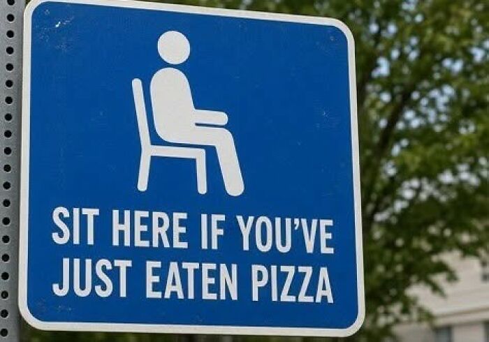A funny sign with a person sitting in a chair, text says: SIT HERE IF YOU'VE JUST EATEN PIZZA.