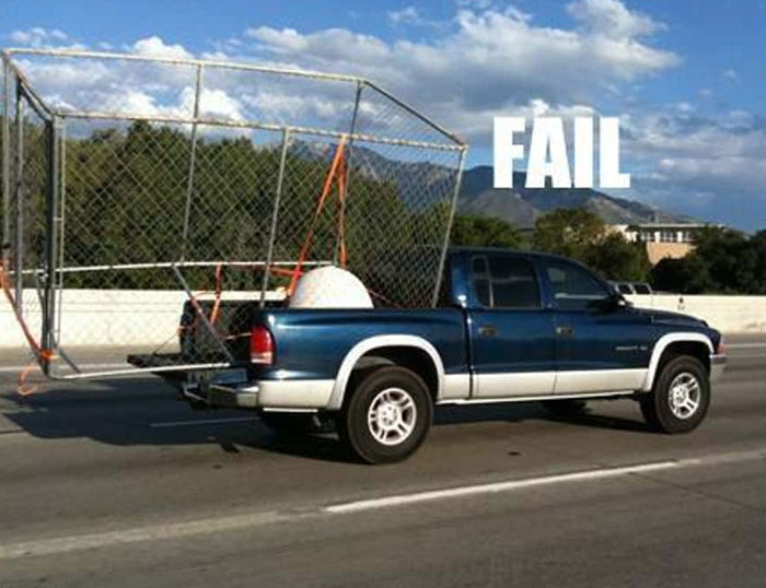 Pickup truck carrying large cage appears unsafe moving fail on highway