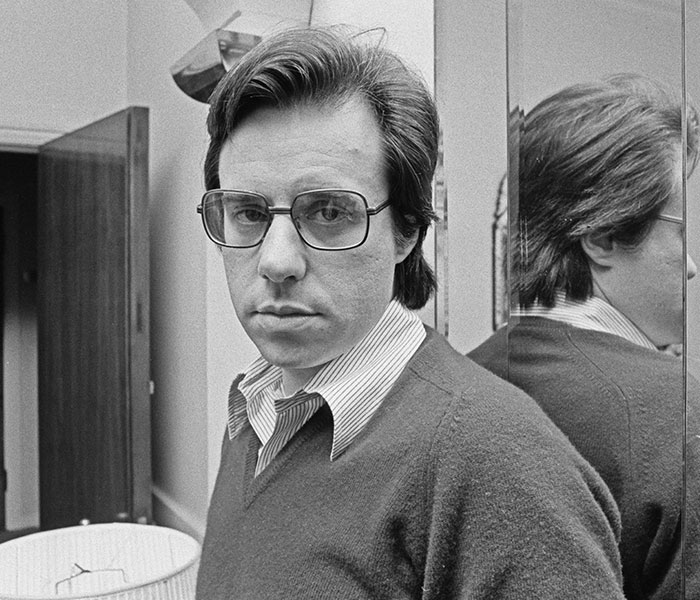 The man who built the beauty goddess's career, captured in a reflective pose, central to her life story. The man who built the beauty goddess's career, captured in a reflective pose, central to her life story.